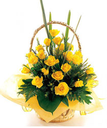 Basket of yellow garberas